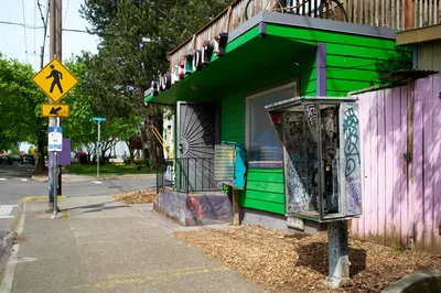 Graffitied Pay Phone on Portland Street Corner