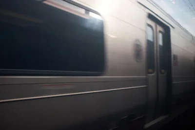 Amtrak Train in Motion at Hudson County Station
