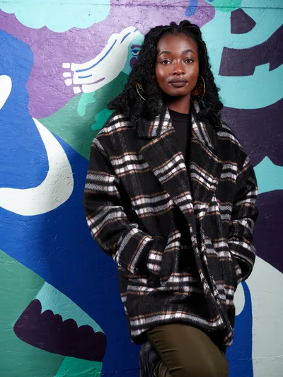 Artist Naomi Likayi Before Her Portland Mural