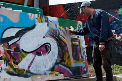 Street Artist Demonstrates Live Spray Painting Technique