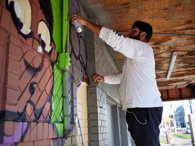 Artist Creates Mural in Portland's Alberta District