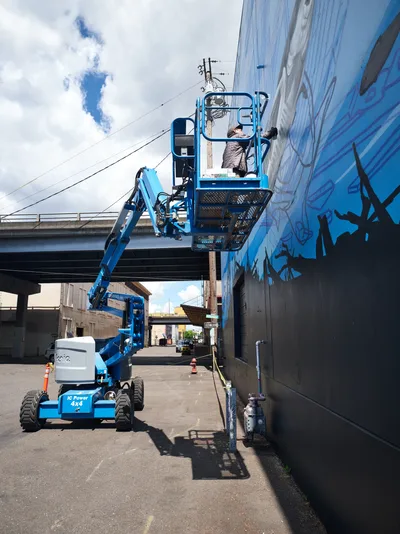 Muralists Create Street Art in Industrial Portland
