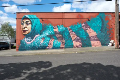 Turquoise Portrait Mural in Portland's Central Eastside