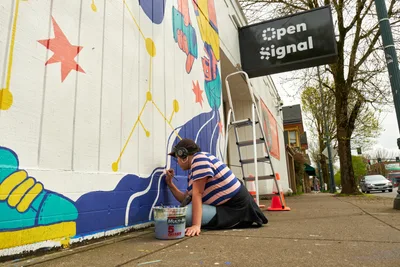Street Artist Creates Community Mural in Portland