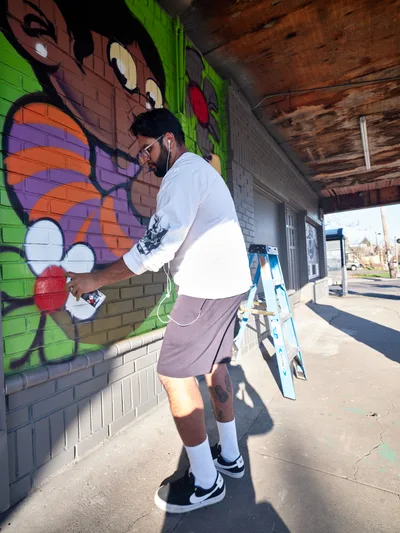 Street Artist Creates Vibrant Mural in Portland